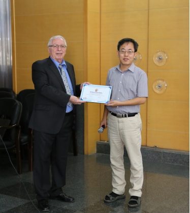 Professor Xiqiao Feng, BICTAM Secretary-General presented Professor Daniel Weihs with the Certificate of 2017 BICTAM Master Lecture Series Program